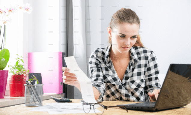 demo-attachment-3454-Smiling-young-woman-calculating-and-paying-bills-in-home-office-4-39051-original-protected-scaled